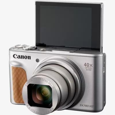 Silberne Canon Kamera, Objektiv ausgefahren, Bildschirm offen, 40x optischer Zoom.