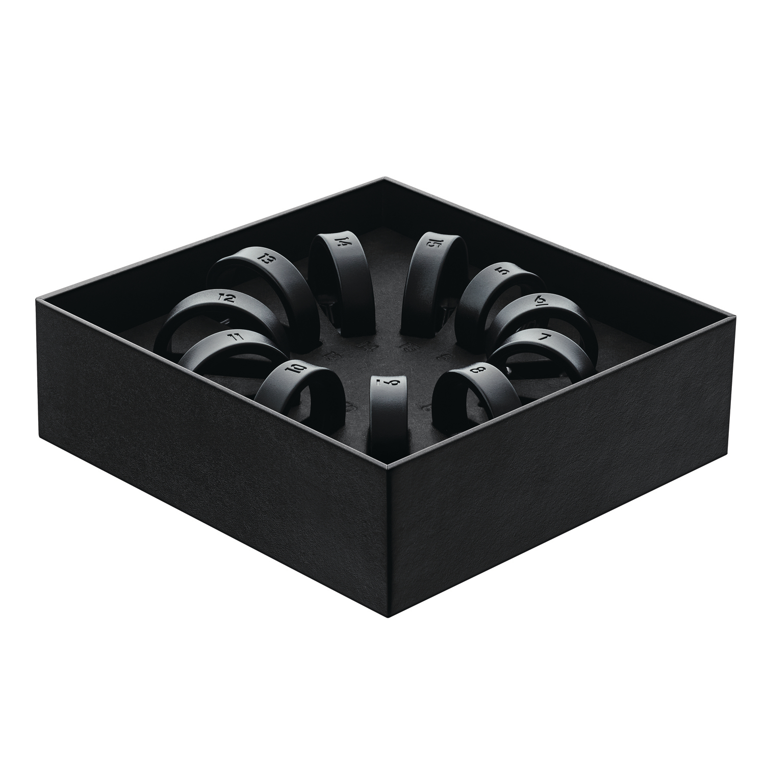 Schwarze quadratische Box mit einem Satz schwarzer Ringe im Inneren, kreisförmig angeordnet.