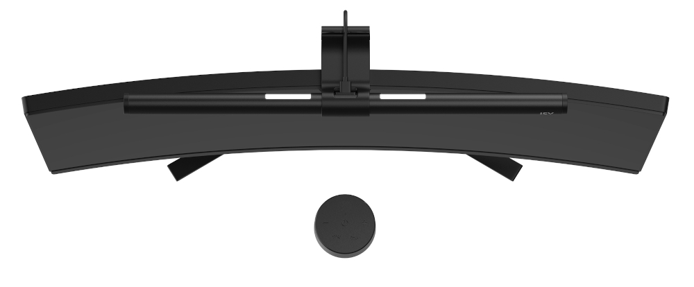 Czarny zakrzywiony monitor z listwą świetlną i panelem sterowania. Widok z góry.