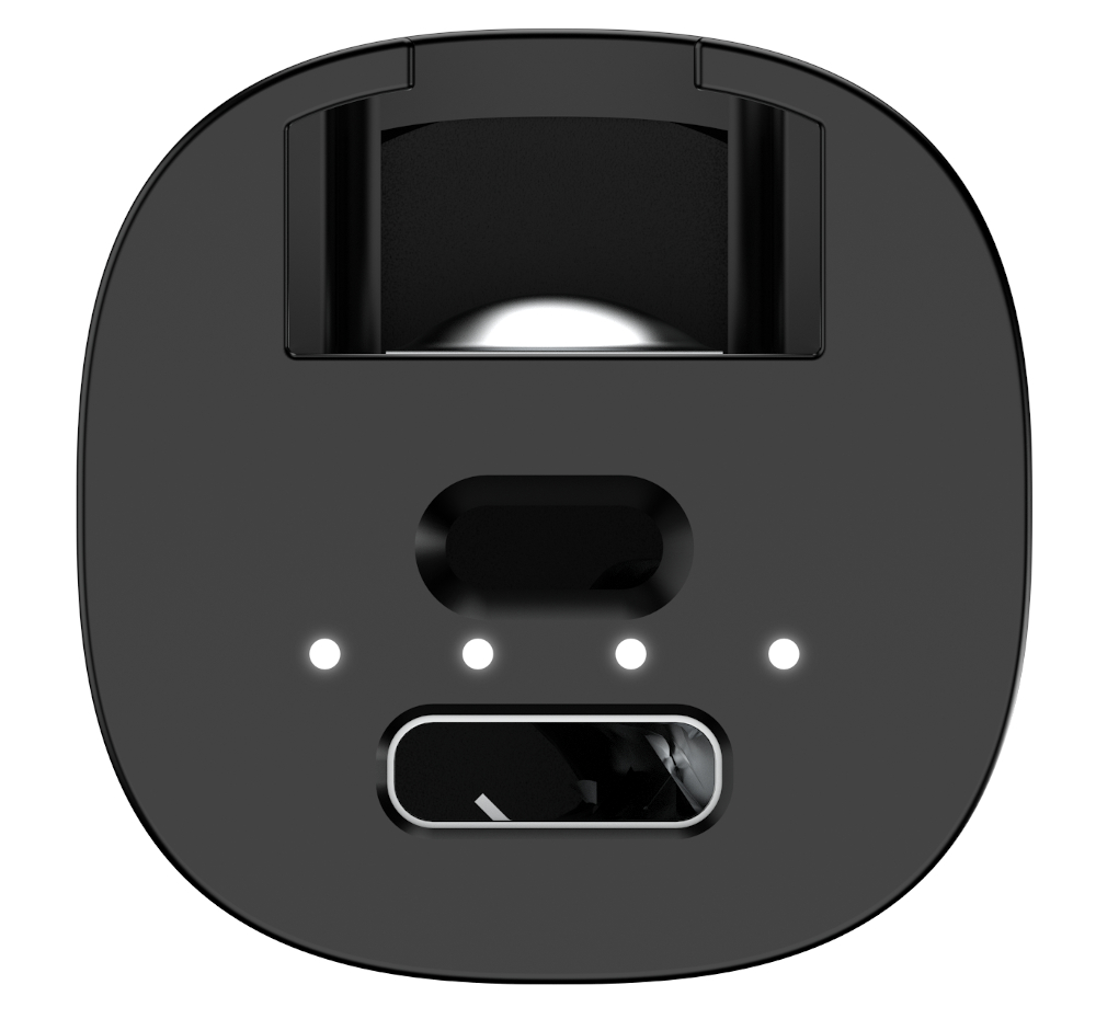 Zbliżenie czarnej ładowarki z trzema białymi lampkami kontrolnymi i portem USB-C.