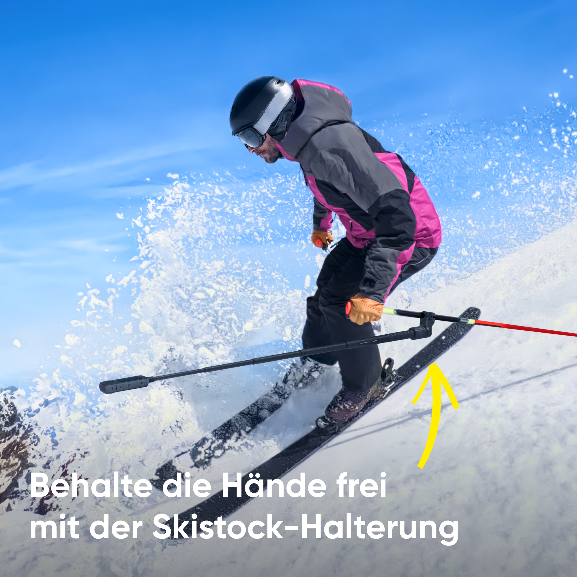 Un skieur descendant une pente enneigée, avec du texte sur le support de bâtons de ski.