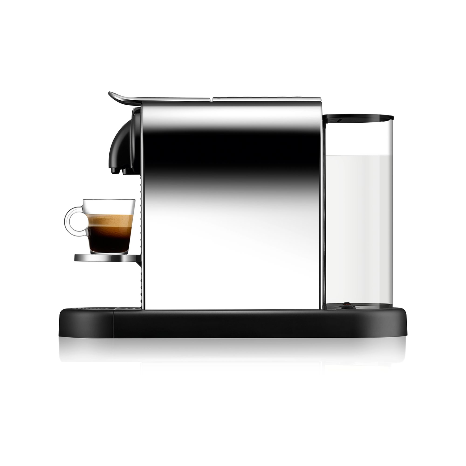 Side view of a Nespresso machine with a cup of coffee and a milk container.
