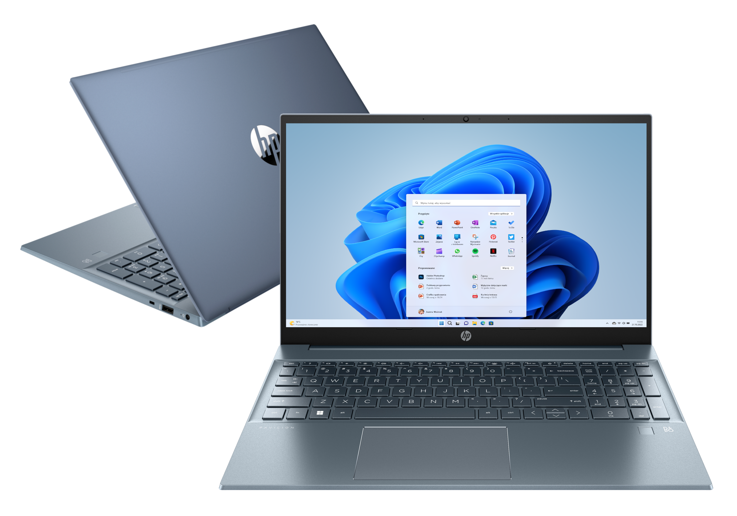 Dwa laptopy, jeden zamknięty, jeden otwarty z interfejsem Windows na ekranie.