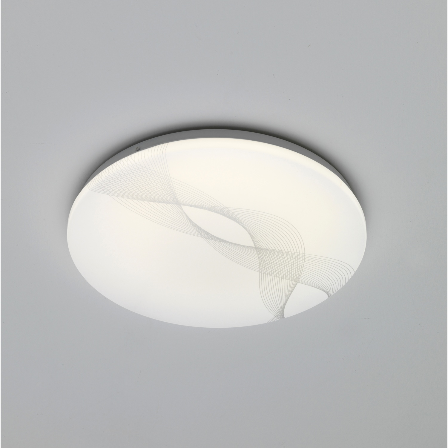 Plafone rotonda bianca con motivo ondulato. Luci spente. Soffitto grigio.