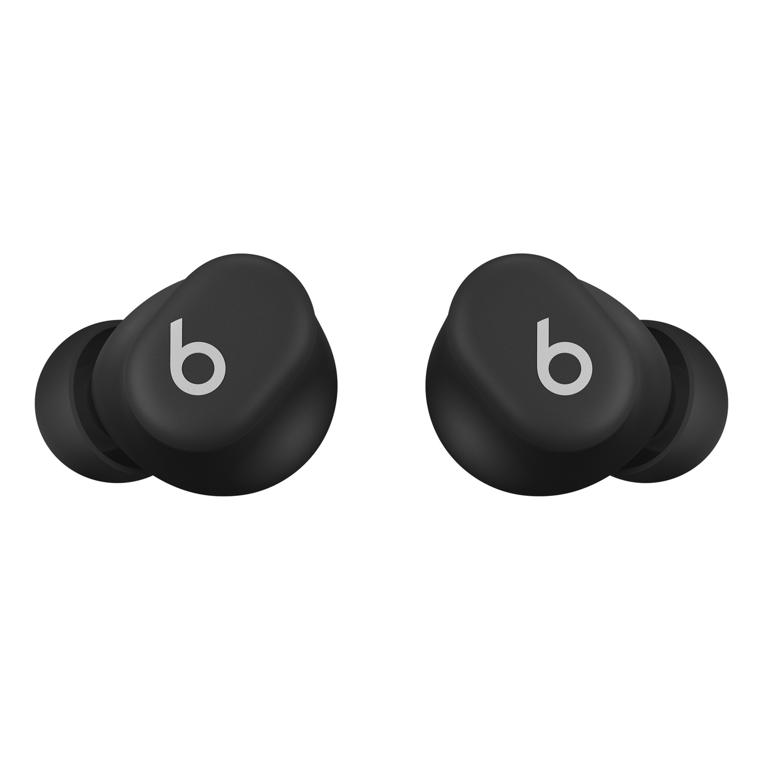 Deux écouteurs Beats noirs avec le logo 'b'. Ils sont placés sur un fond blanc, mettant en valeur leur design.