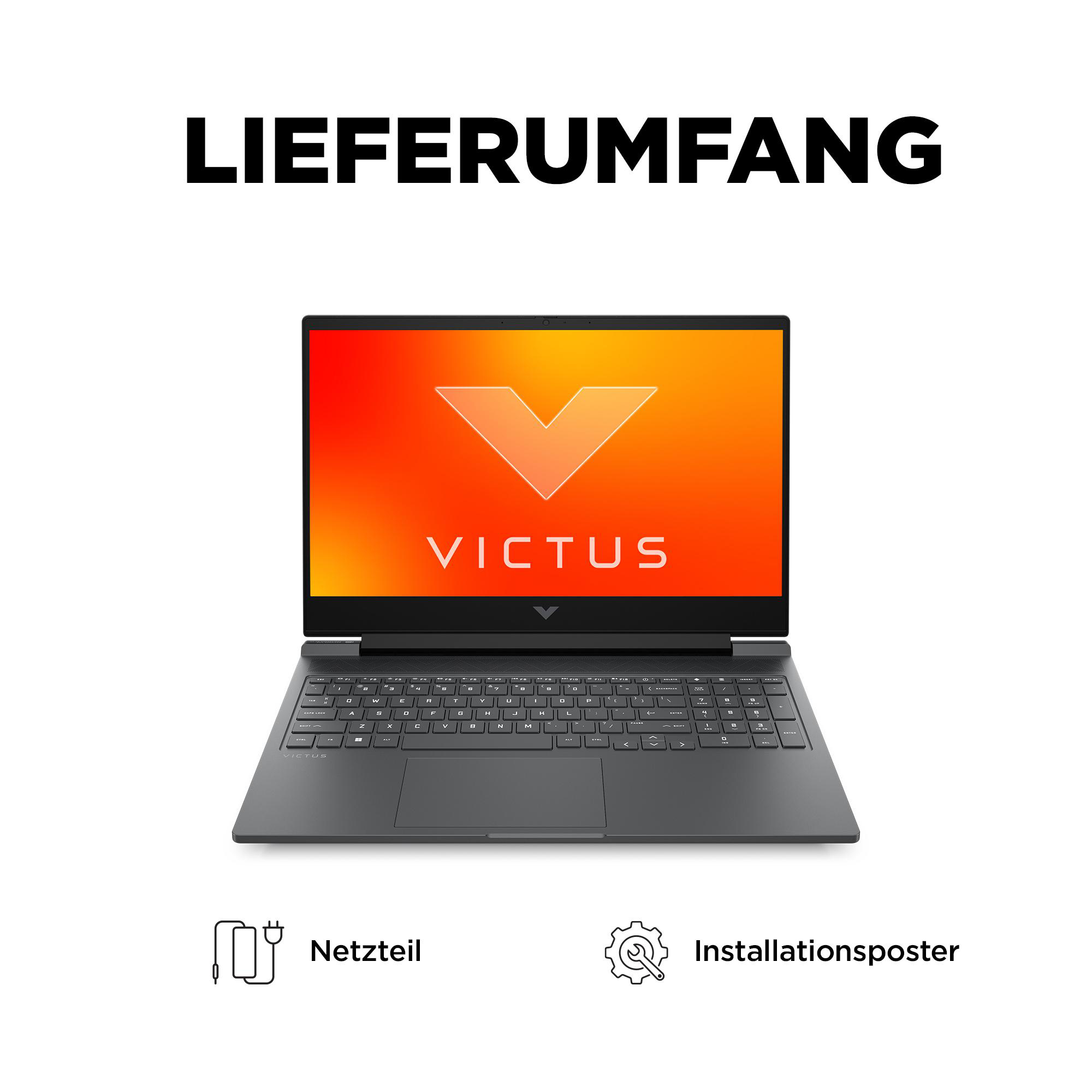 Laptop mit orangefarbenem Victus-Bildschirm. Netzteil und Installationsposter sind abgebildet.