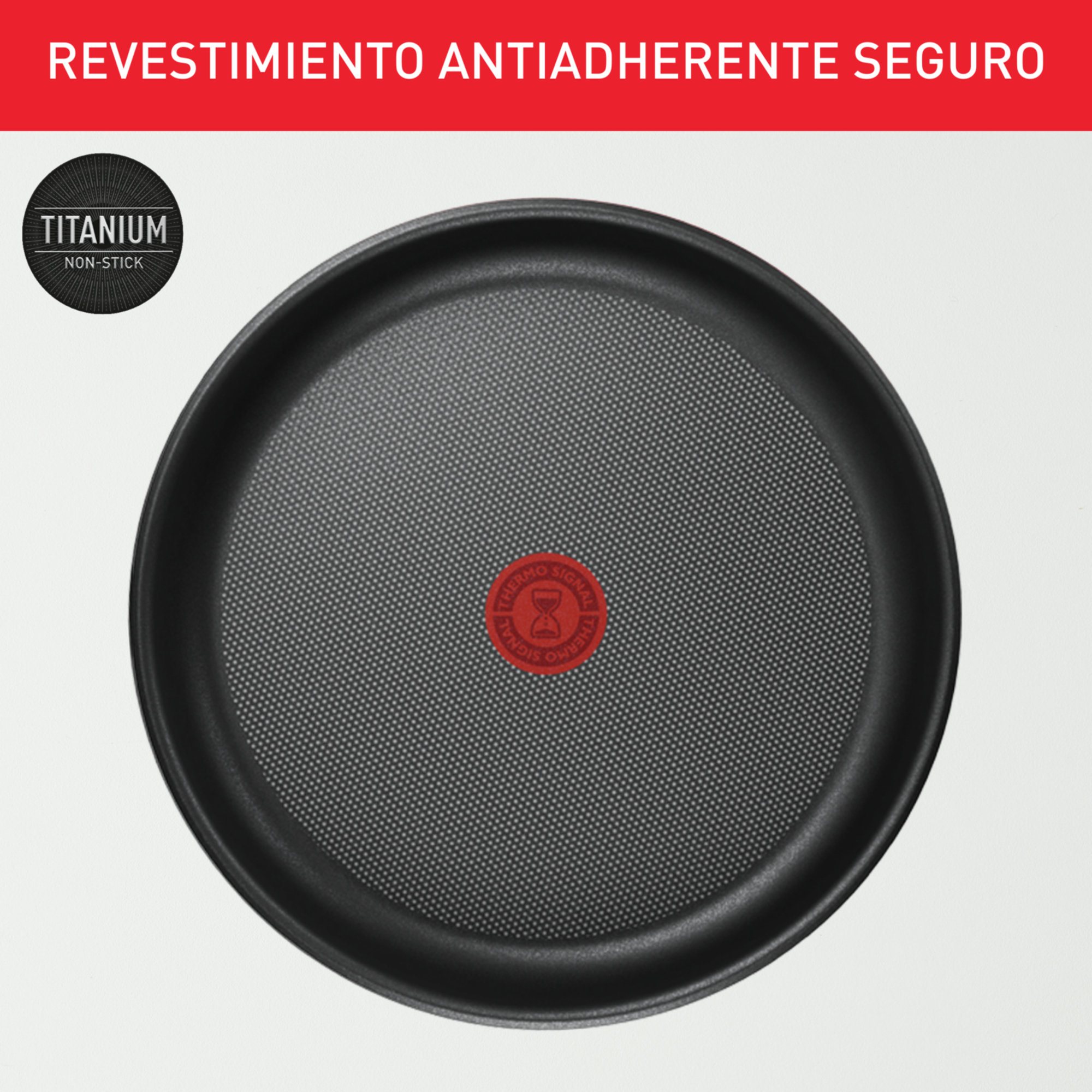 Sartén negra con Thermo-Spot rojo en el centro.