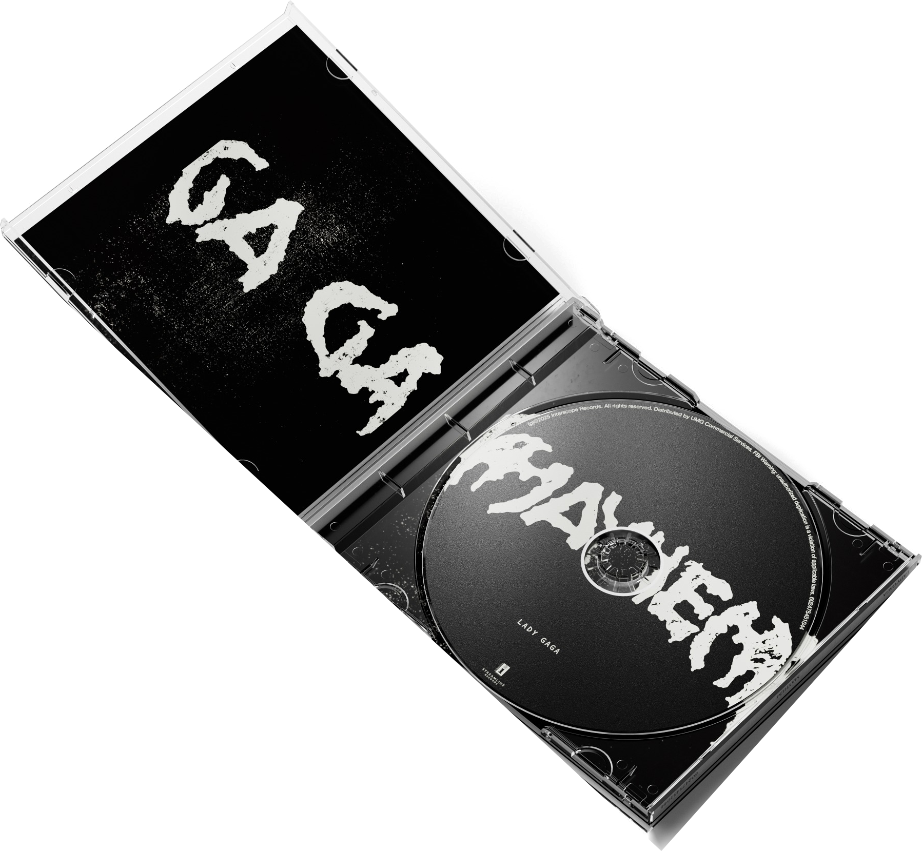 CD-Hülle geöffnet. Die CD ist schwarz mit weißem Text. Cover hat 'GAGA' in Weiß geschrieben. Die CD sagt 'MAYHEM'.