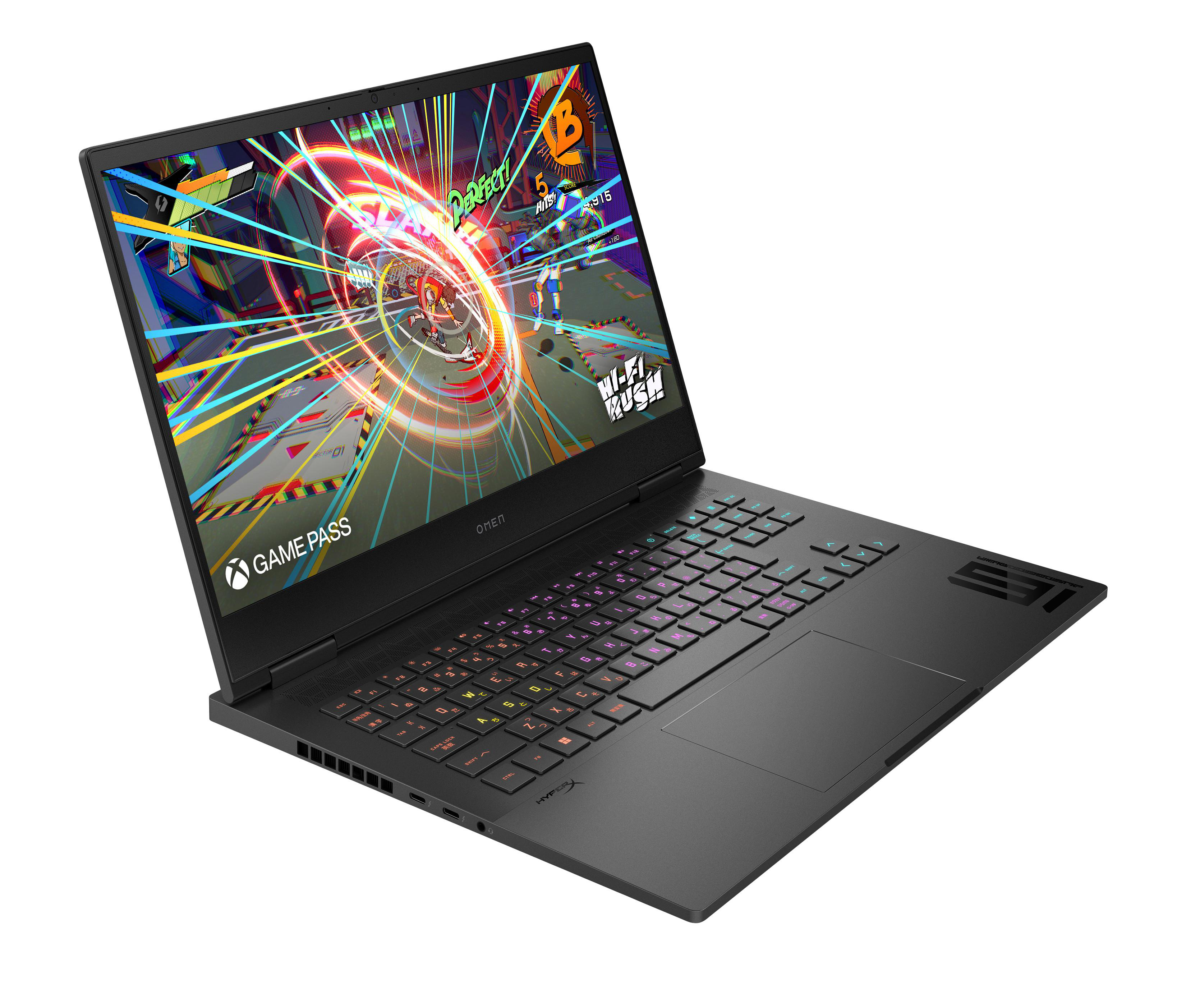Ein schwarzer Laptop, der ein farbenfrohes Videospiel auf weißem Hintergrund anzeigt.