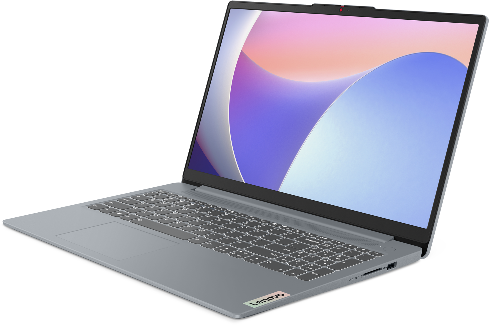 Egy szürke laptop nyitva van, színes hátteret mutat.