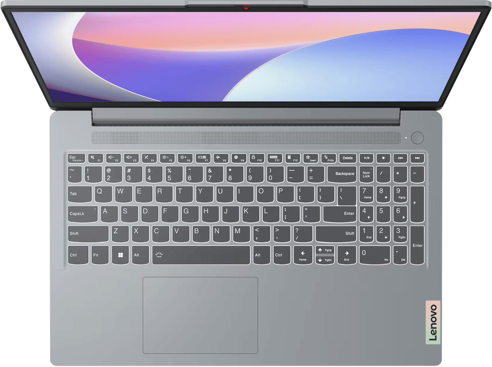 Laptop felülnézetben, nyitva. Szürke billentyűzet és érintőpad. Lenovo logó látható.