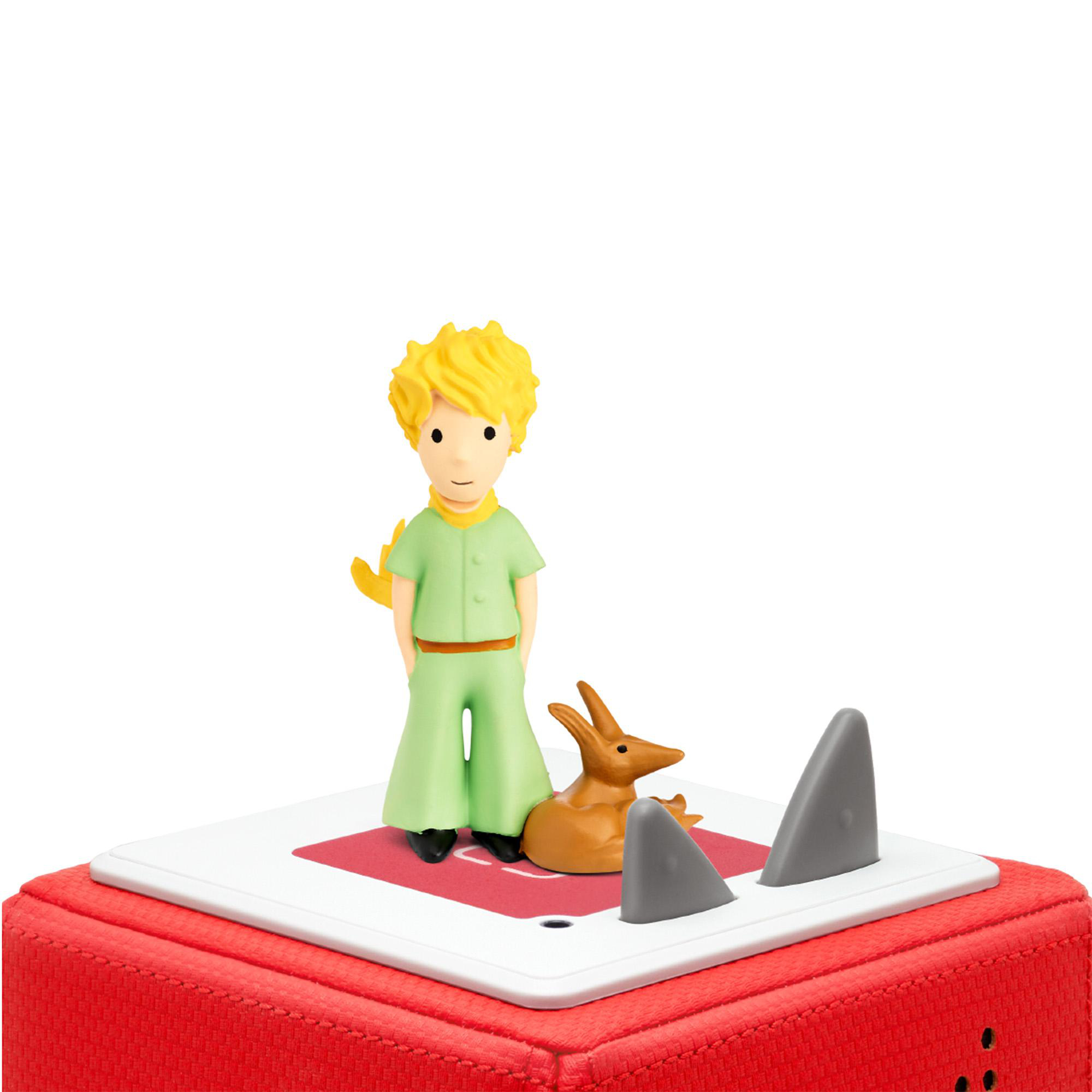 Eine Figur des Kleinen Prinzen und ein Fuchs auf einer roten Box.