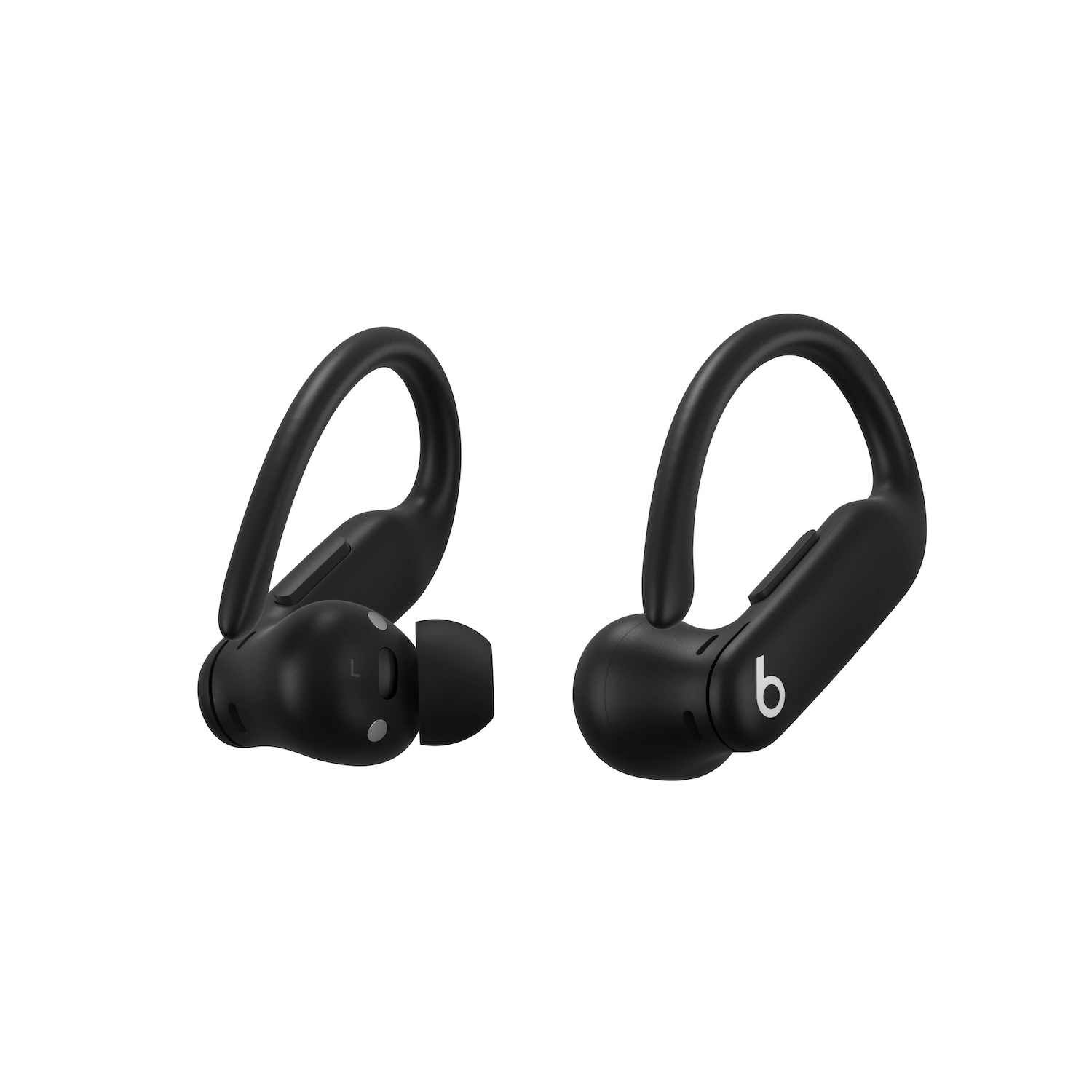 Dos auriculares inalámbricos Beats negros sobre una superficie blanca.