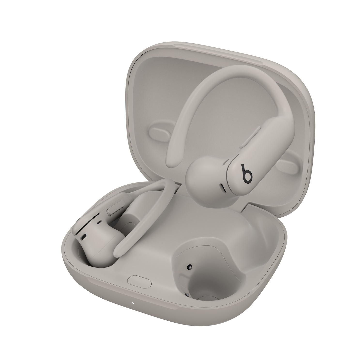 Auriculares inalámbricos grises en un estuche de carga, con la letra 'b' en el auricular.