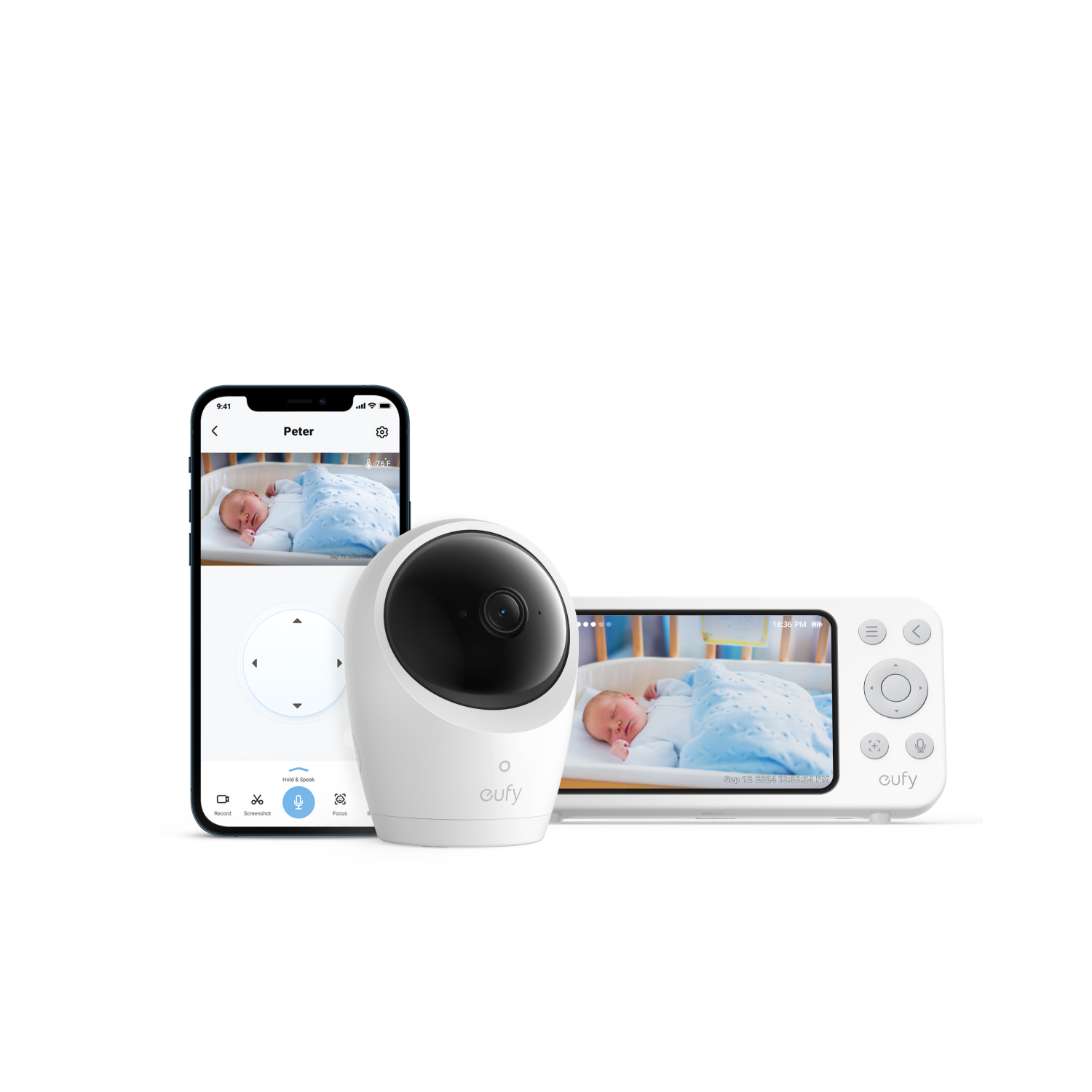 Babyfoon met baby in een wieg, smartphone en monitor op een wit oppervlak.