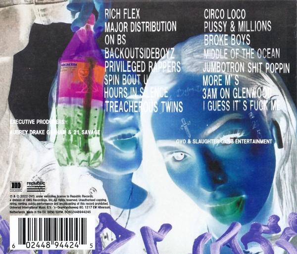 Pochette d'album avec deux visages, liste des titres et logo.