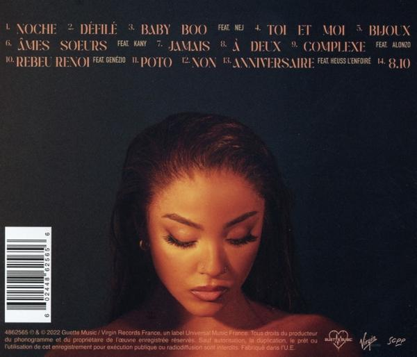 Rückseite einer CD mit dem Gesicht einer Frau und Songtiteln darauf.