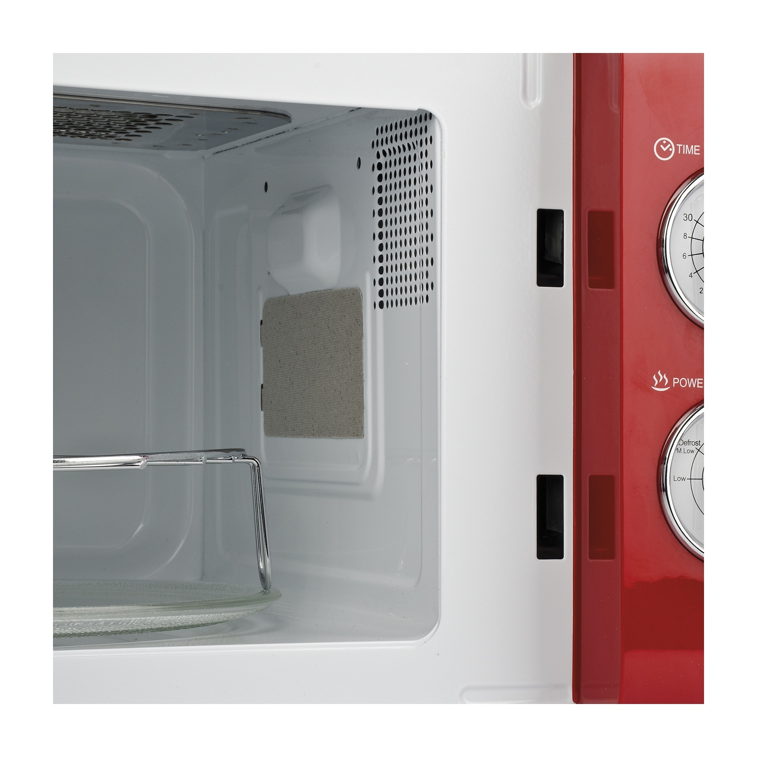 Interno di un forno a microonde rosso e bianco, che mostra l'interno, il piatto in vetro e la ventilazione.