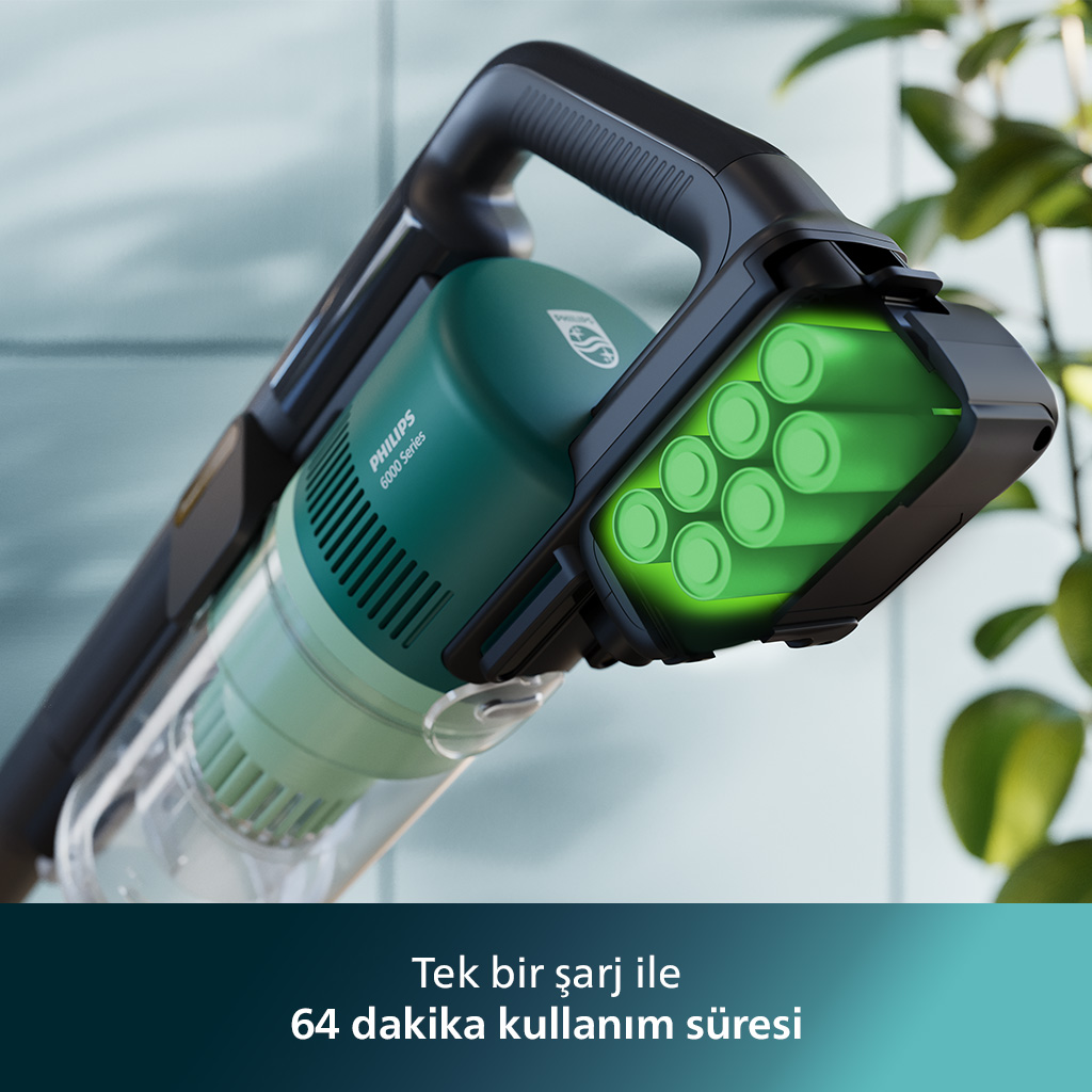 Şarj ünitesiyle yeşil ve deniz mavisi kablosuz elektrikli süpürge. Yeşil pil takımı vurgulanmış.