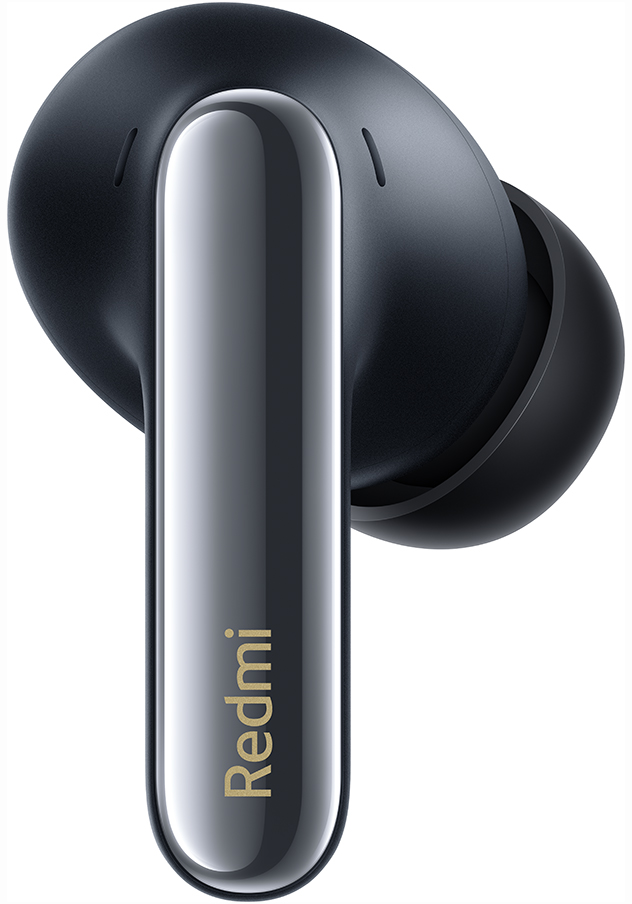 Un écouteur Redmi noir, en gros plan.