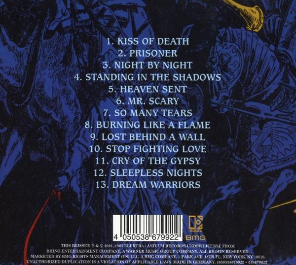 Albumcover mit Titelliste. Titel ist auf Englisch. Listet 13 Songs auf dunklem Hintergrund auf.