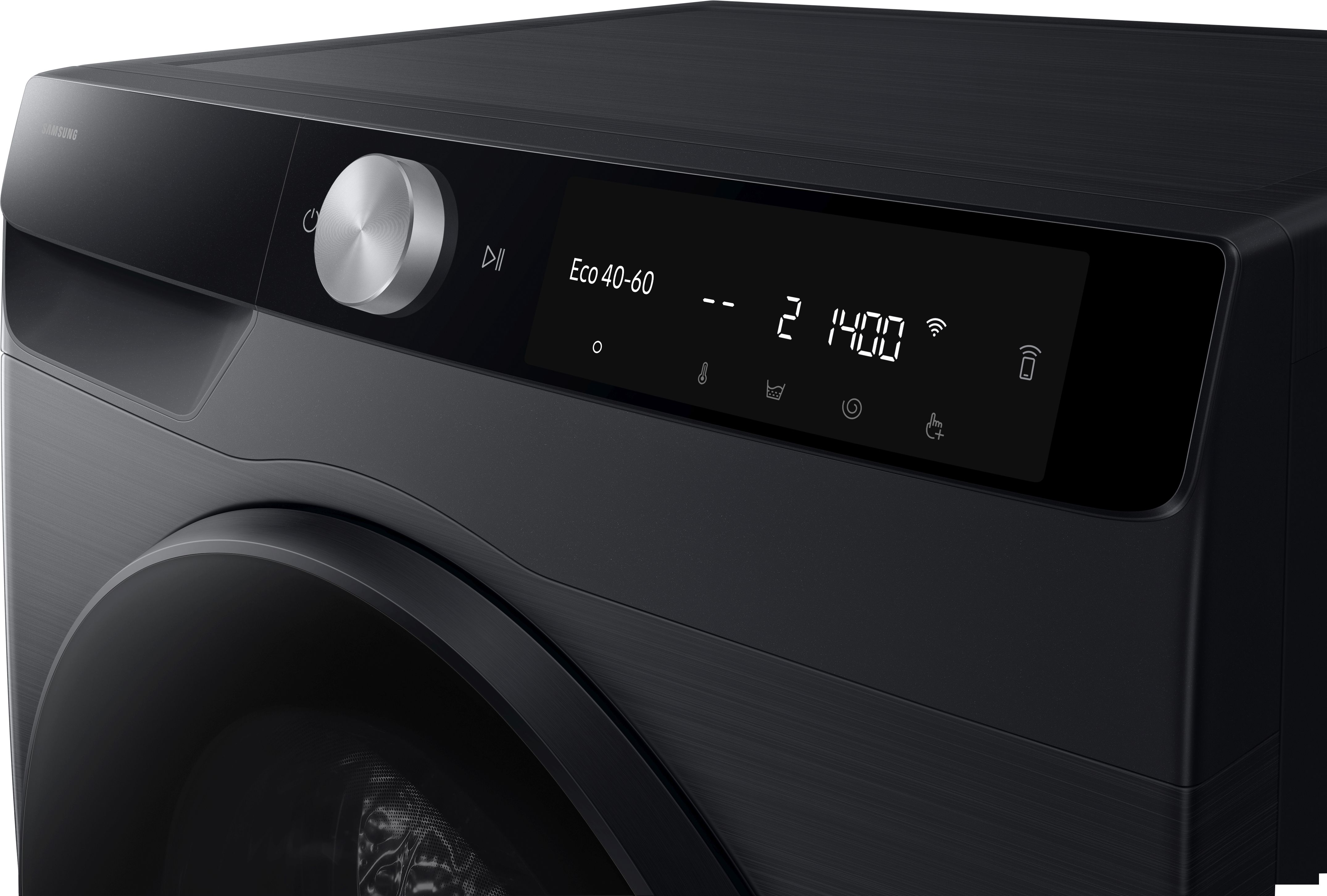 Das Bedienfeld einer schwarzen Samsung Waschmaschine ist sichtbar. Es hat einen Drehknopf, ein Display und eine runde Tür.