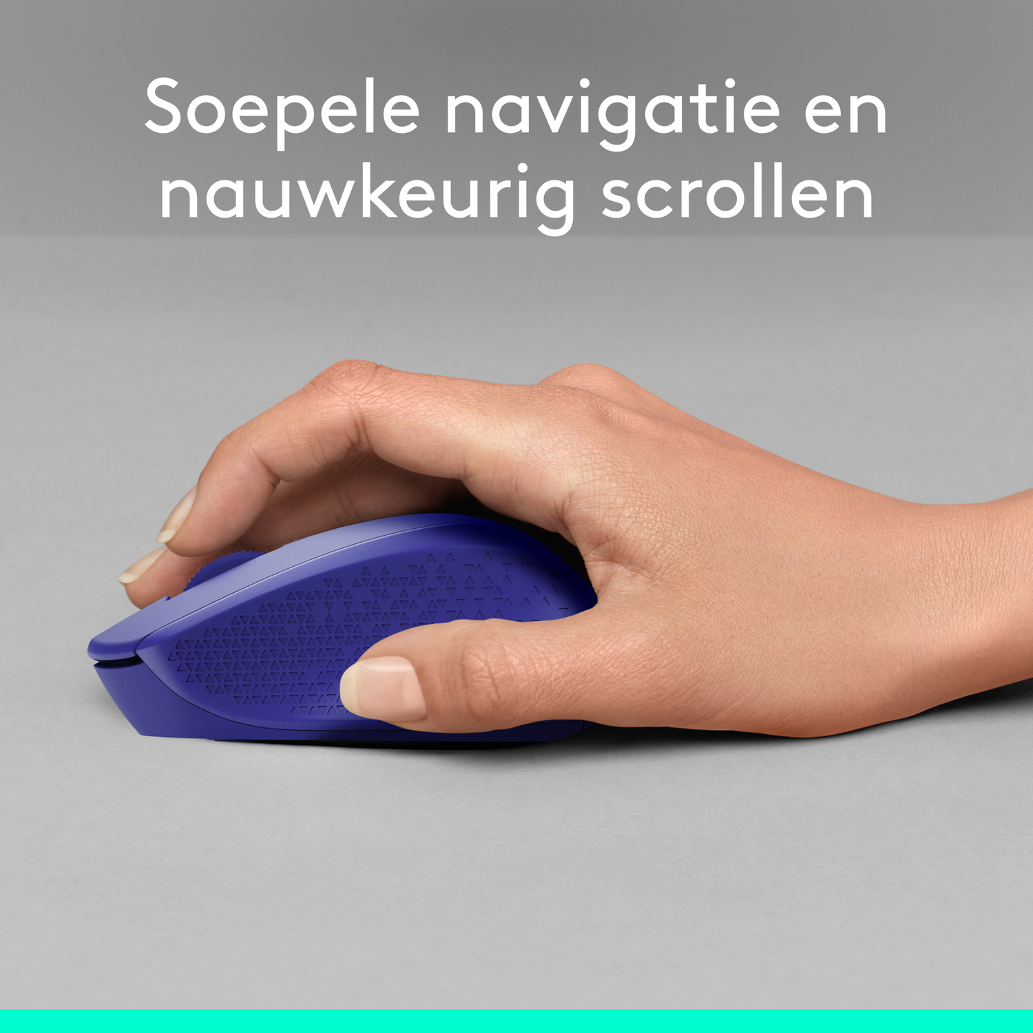 Hand using a purple mouse on a gray surface, showing scrolling and navigation.