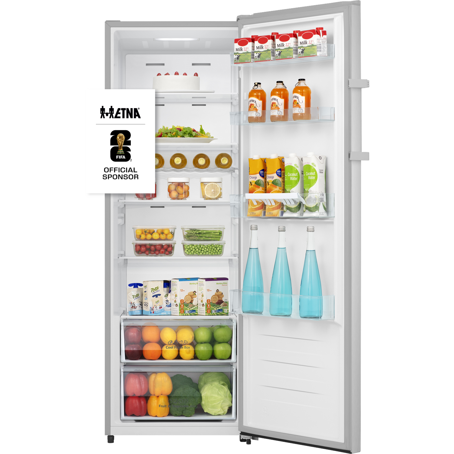 Open refrigerator with milk, fruit, vegetables, drinks, and a cake.
