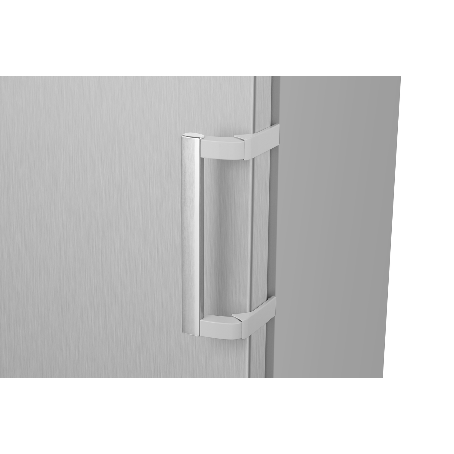 Close-up of a silver refrigerator handle on a closed door.