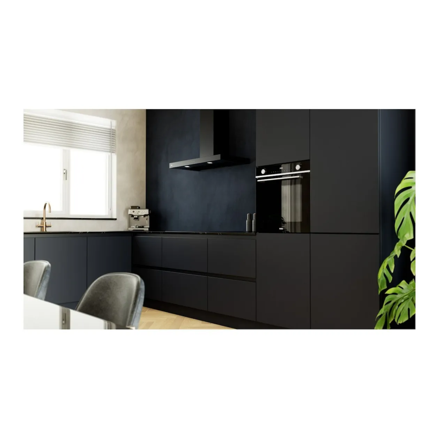 Kitchen scene with black cabinets and appliances.