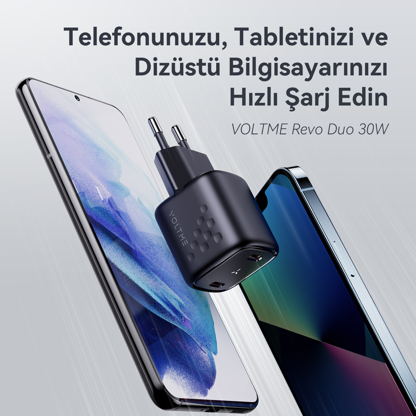 İki telefonlu siyah şarj cihazı, Türkçe metin.