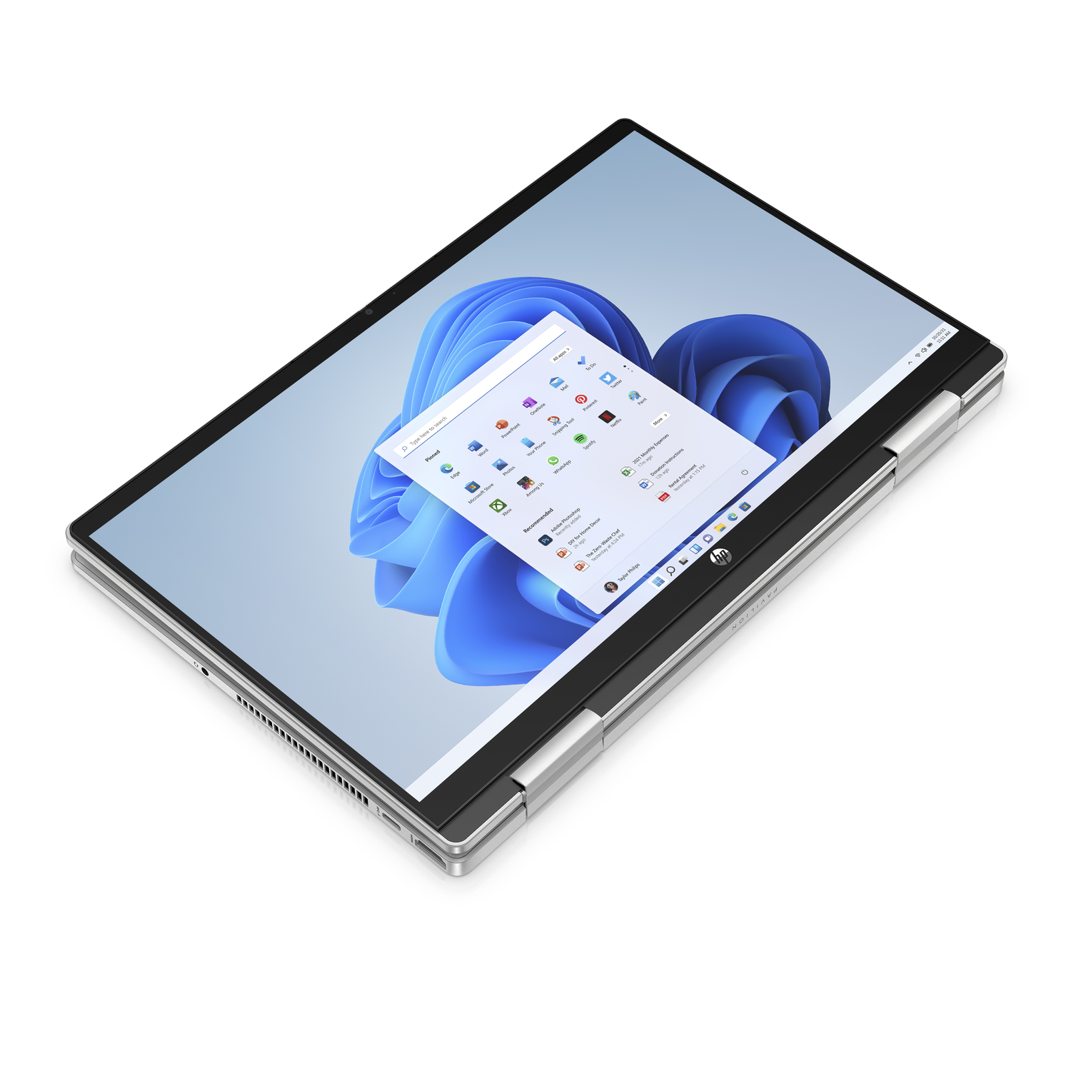 A silver and black laptop showing a Windows 11 interface on the screen.
