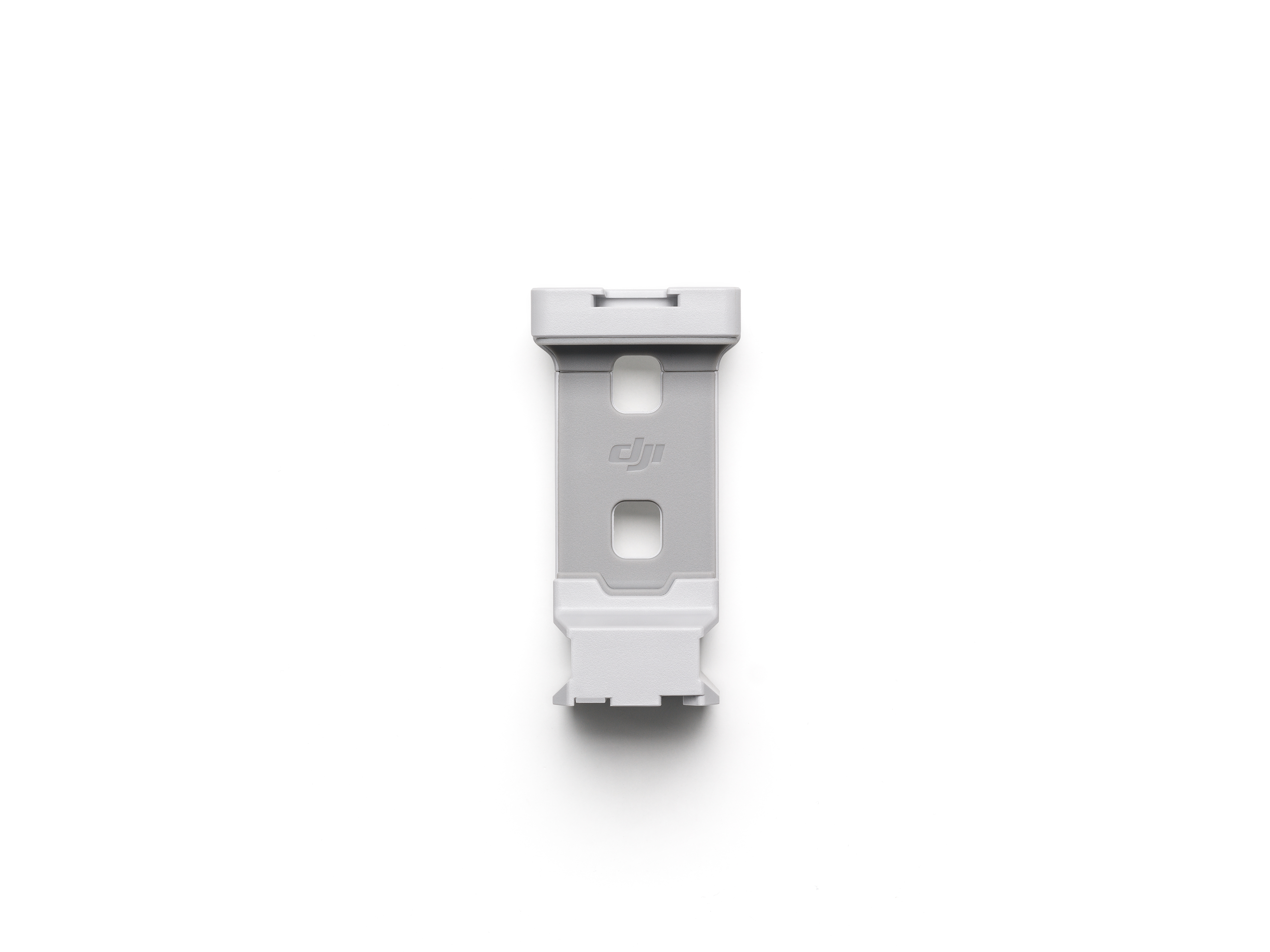Weißes und graues DJI-Zubehör. Es hat zwei Schlitze und das DJI-Logo. Weißer Hintergrund.