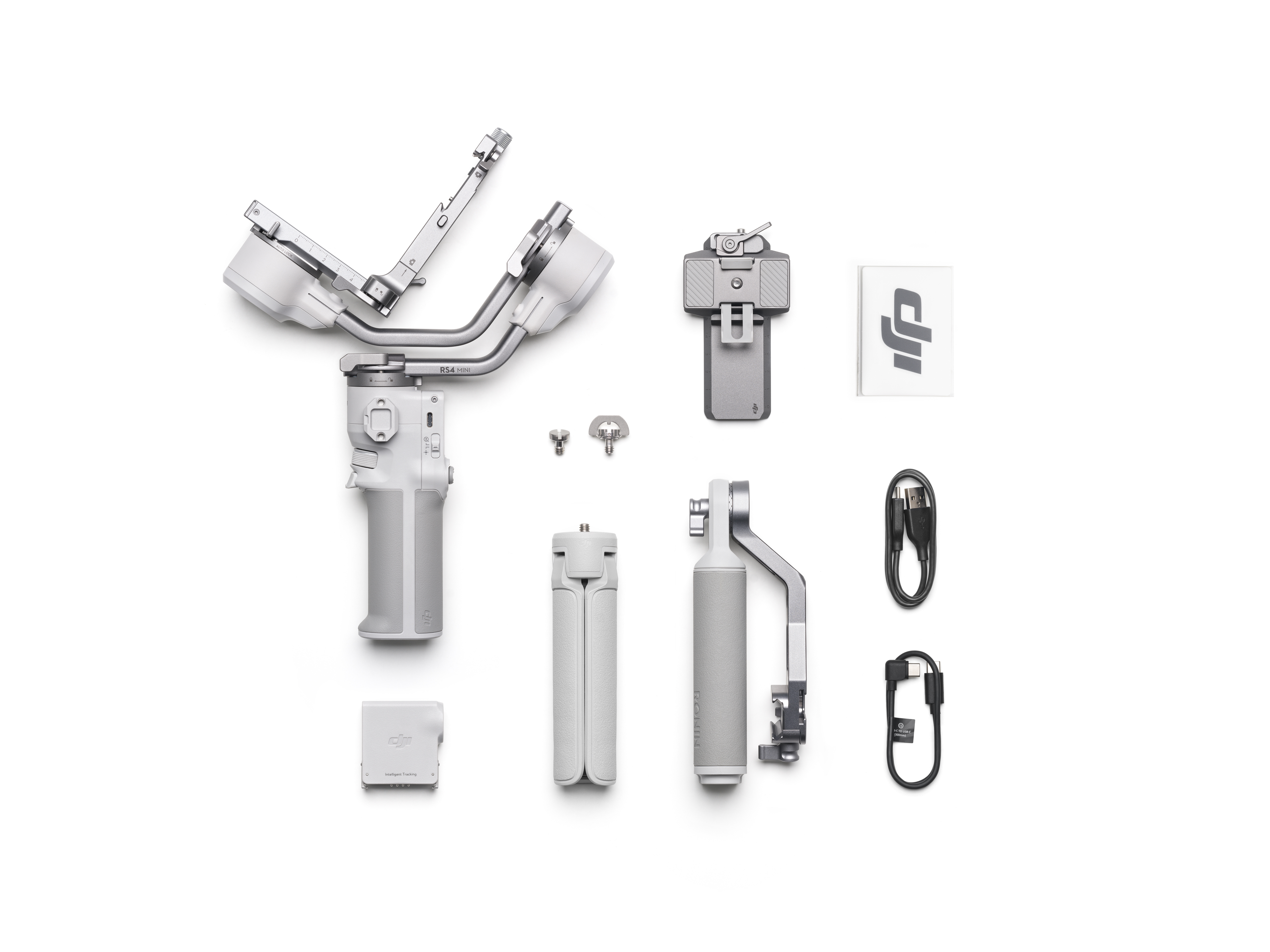 Eine Draufsicht auf ein zerlegtes DJI-Stabilisator-Kit mit verschiedenen Komponenten, die ordentlich angeordnet sind.