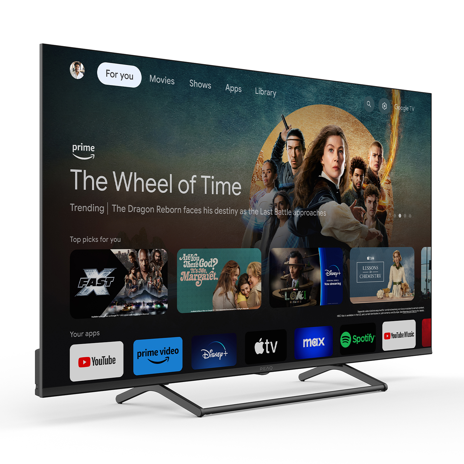 Google TV su uno schermo grande, con un programma e icone di app.
