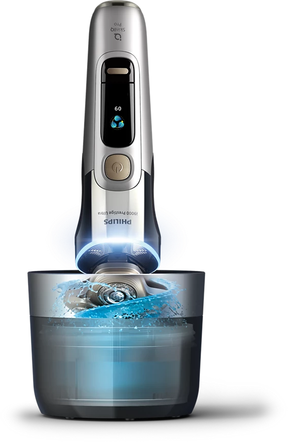 Ezüst-fekete Philips borotva, töltő- és tisztítóállomással.