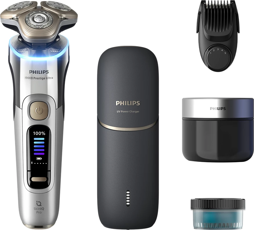 Philips i9000 Prestige Ultra borotva, töltőállomás, trimmer és egyéb kiegészítők, mind látható.