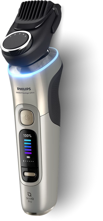 Ezüst és fekete Philips borotva. Tartalmazza a trimmert, a bekapcsológombot és az akkumulátor jelzőt.