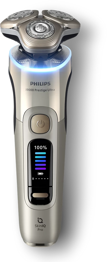 Philips i9000 Prestige Ultra borotva. Ezüst és arany test, digitális kijelzővel.