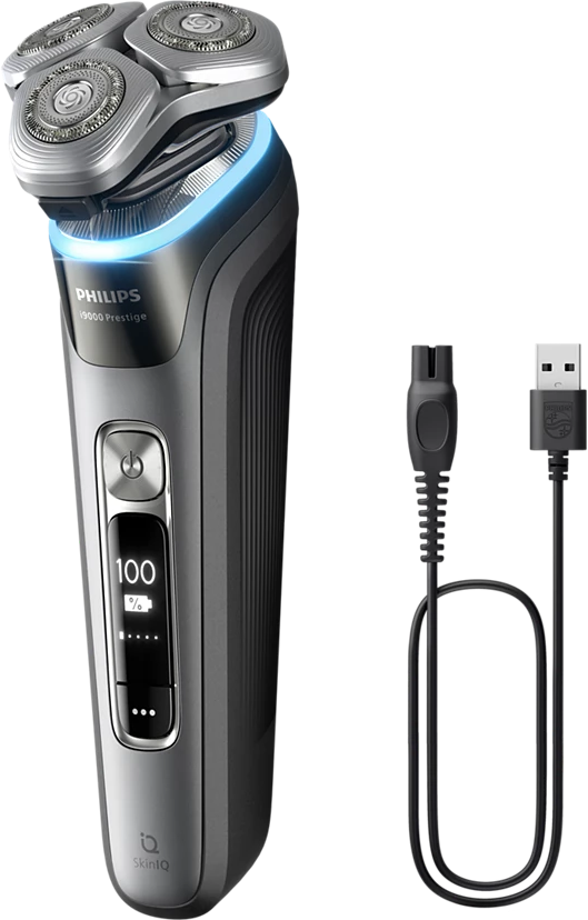 Ezüst Philips borotva töltőkábellel és kijelzővel.