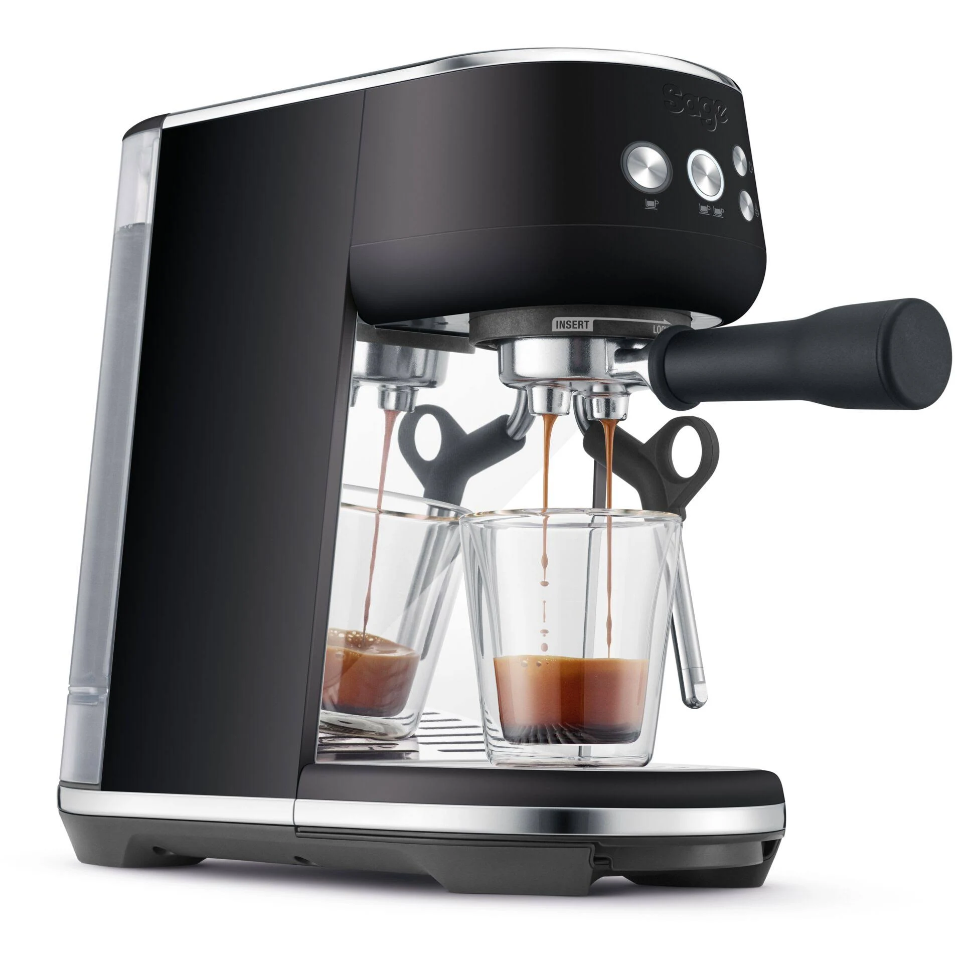 Máquina de espresso negra con café vertiéndose en dos tazas de vidrio.