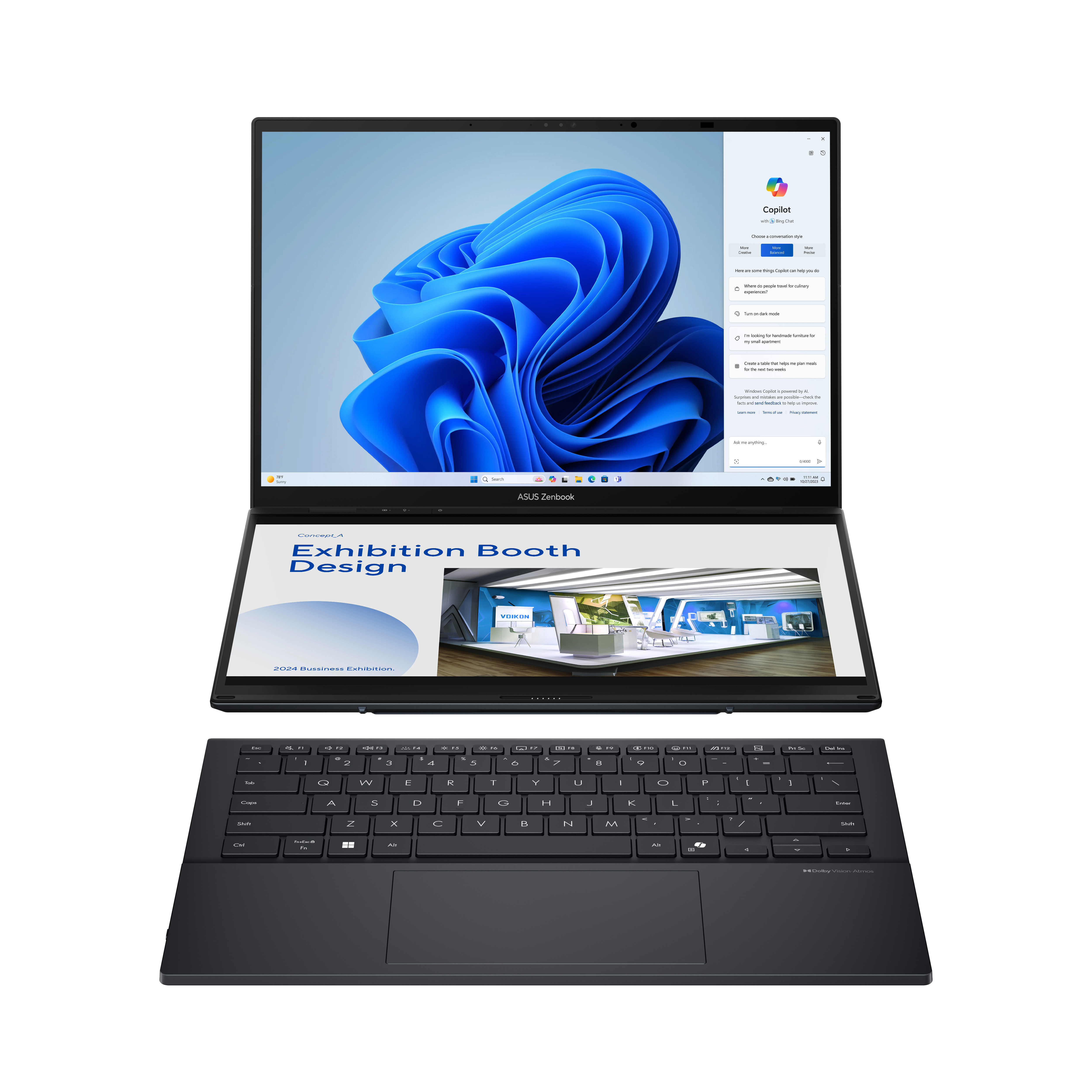 Schwarzer Laptop offen, Tastatur sichtbar. Bildschirm zeigt blaues abstraktes Bild und Copilot-Fenster.