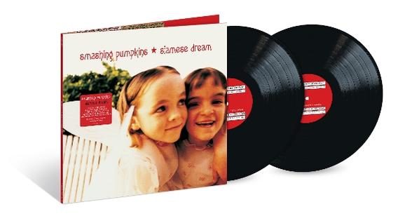 Smashing Pumpkins Albumcover mit zwei Kindern und zwei schwarzen Schallplatten.