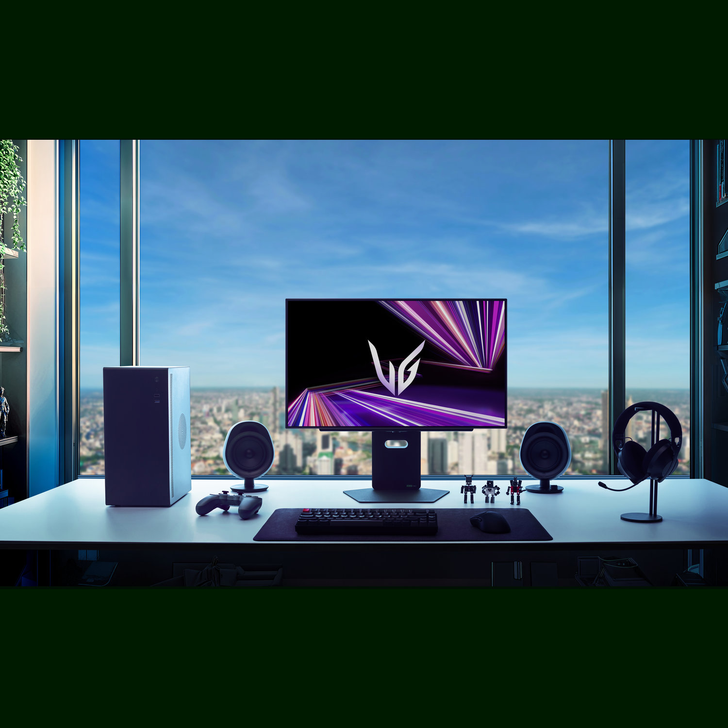 Gaming setup with a monitor displaying a logo, speakers, keyboard, and headset, with a cityscape visible through the window.