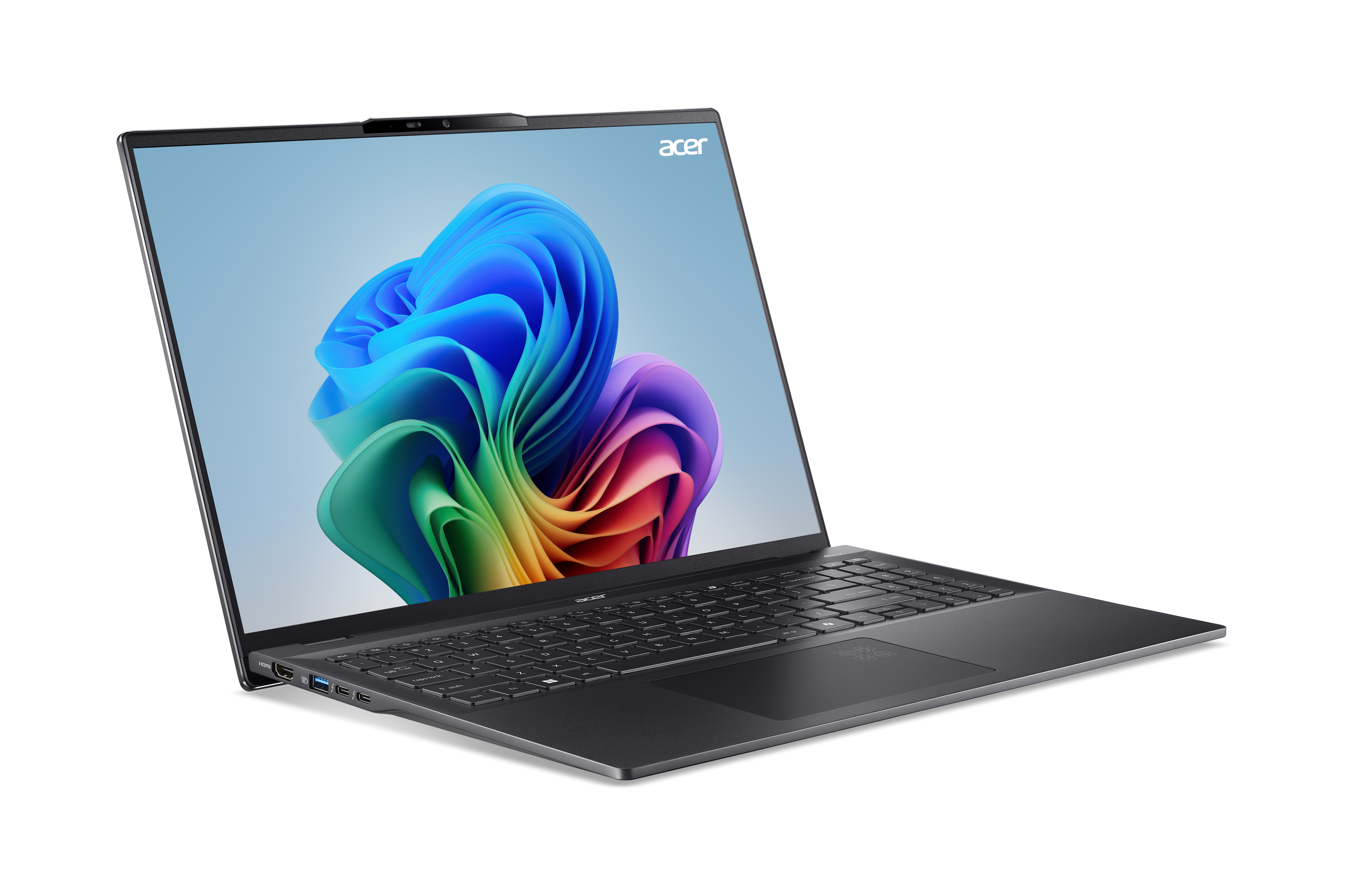 Ein Laptop mit buntem Bildschirm auf schwarzem Untergrund.