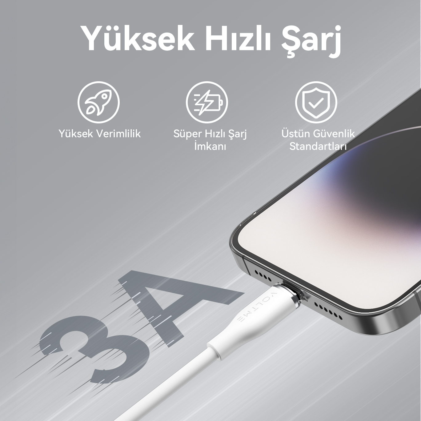 Bir telefona bağlı beyaz bir şarj kablosu.