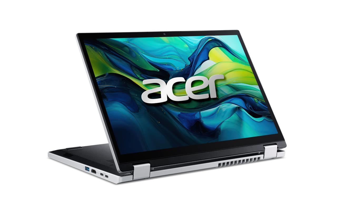 Ein silbernes Laptop mit dem Acer-Logo auf dem Bildschirm, geöffnet auf schwarzem Hintergrund.