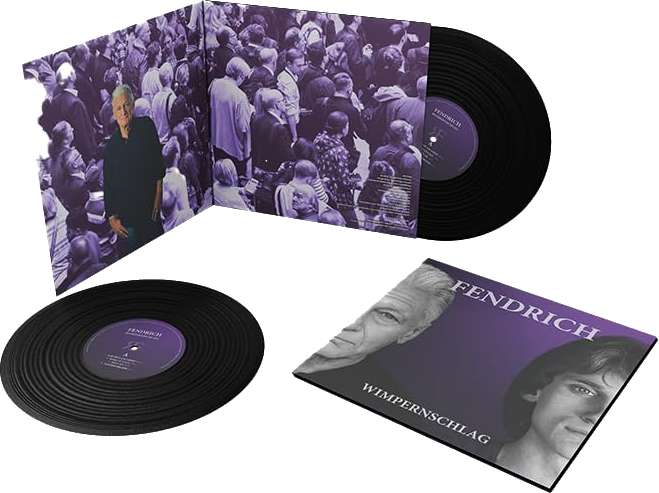 Zwei schwarze Schallplatten und eine Hülle mit einem Foto eines Mannes.