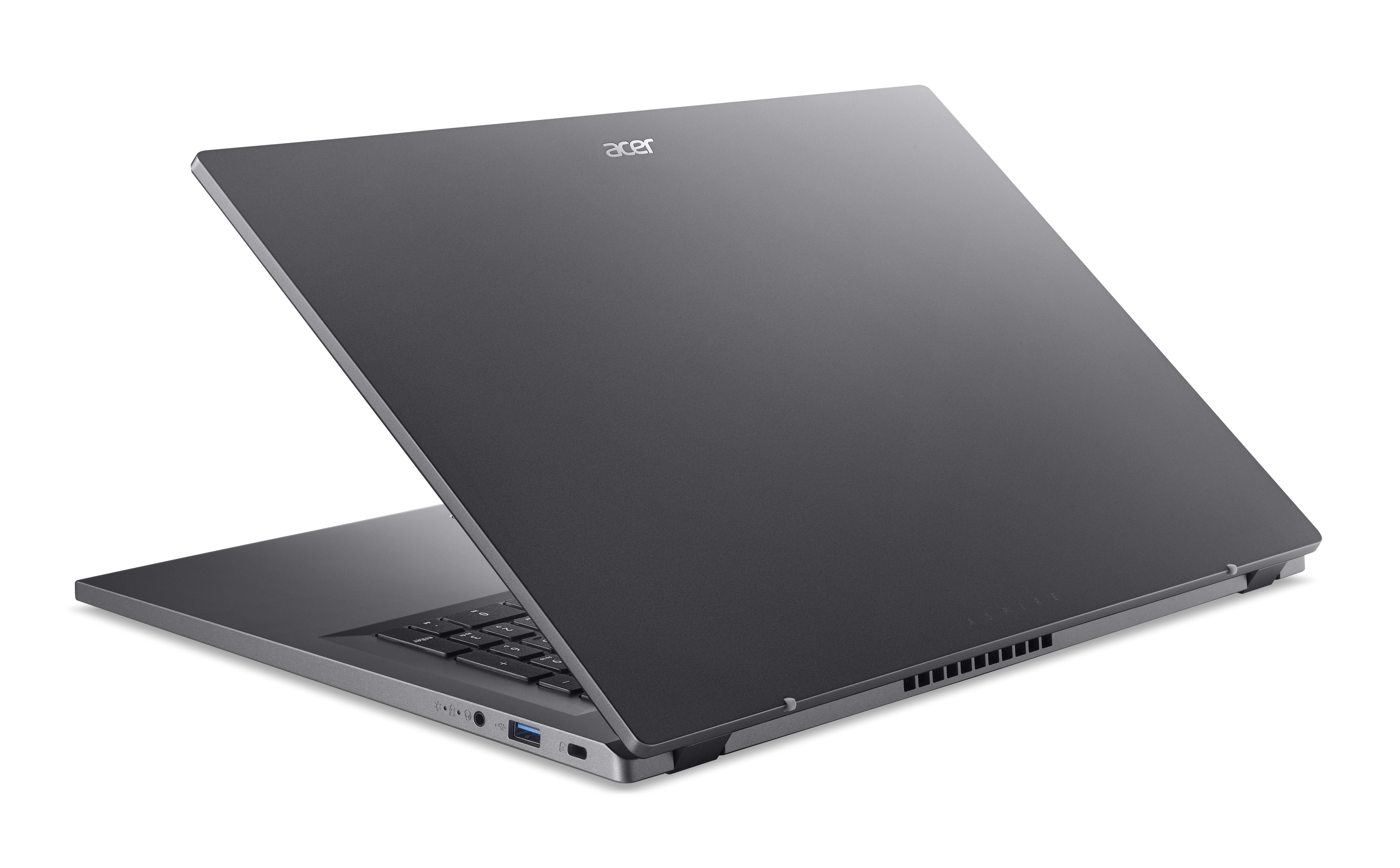 Ein grauer Laptop, der in einem Winkel geöffnet ist und die Tastatur und den Bildschirm vor schwarzem Hintergrund zeigt.