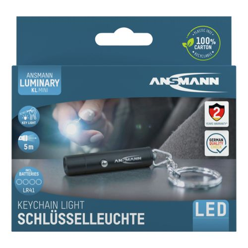 Eine schwarze Schlüsselbund-Taschenlampe in einer Box.